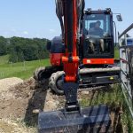 bagger-tom Graben, Strassen, Bauten
