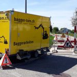 bagger-tom Graben, Strassen, Bauten